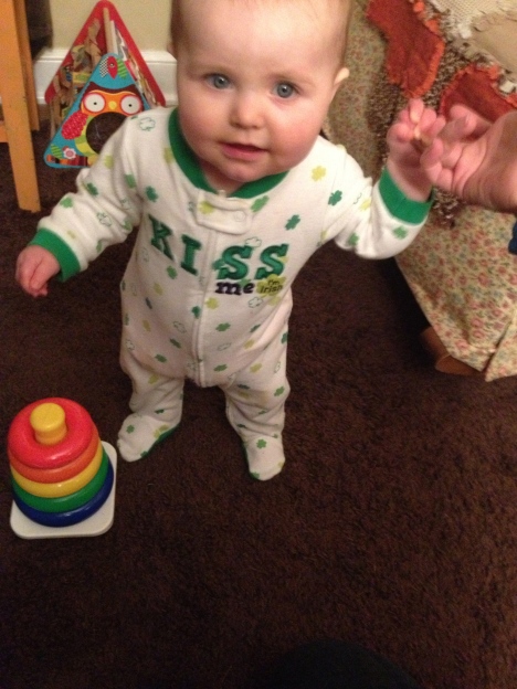 She's been wearing these PJs for awhile, but they were especially perfect for St. Patty's Day...and she has her rainbow rings to complete the leprechaun look.